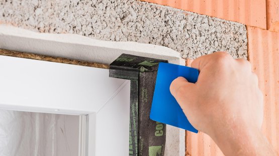 5. Start applying tape at the top of the frame